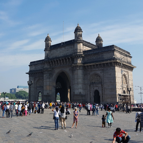 tourists in front of building
